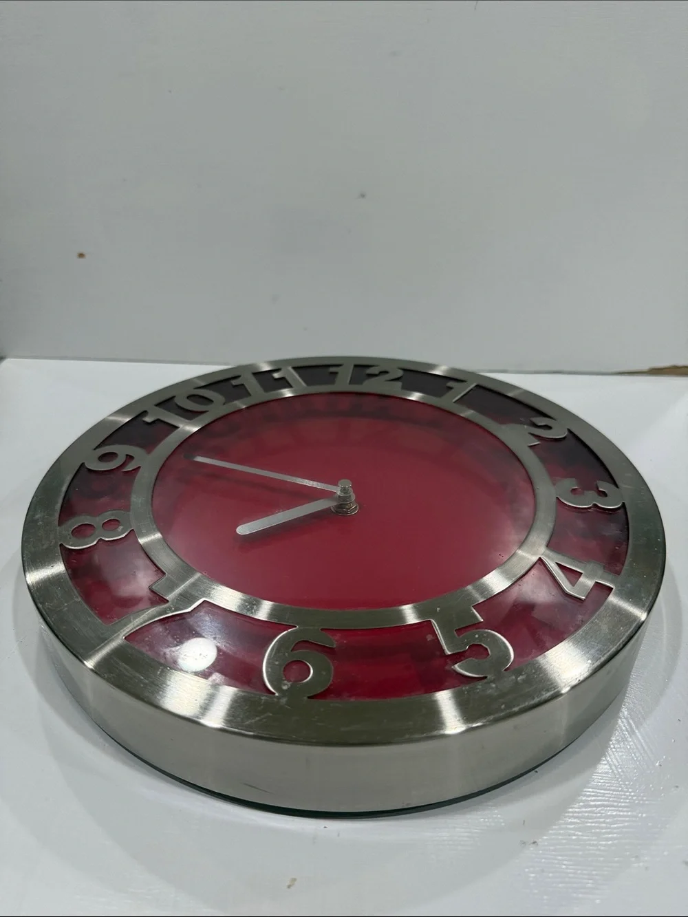 Contemporary Red Wall Clock 11” in Diameter with Brushed Silver Numeral Frame